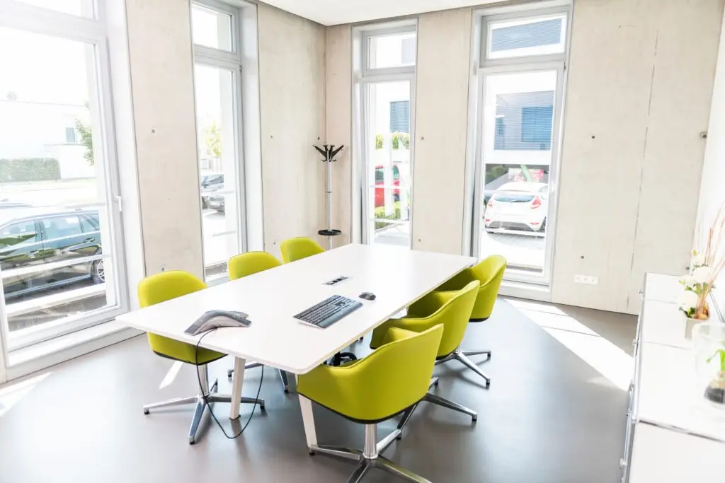 conference room with windows and green chairs at the iT Engineering software innovations building